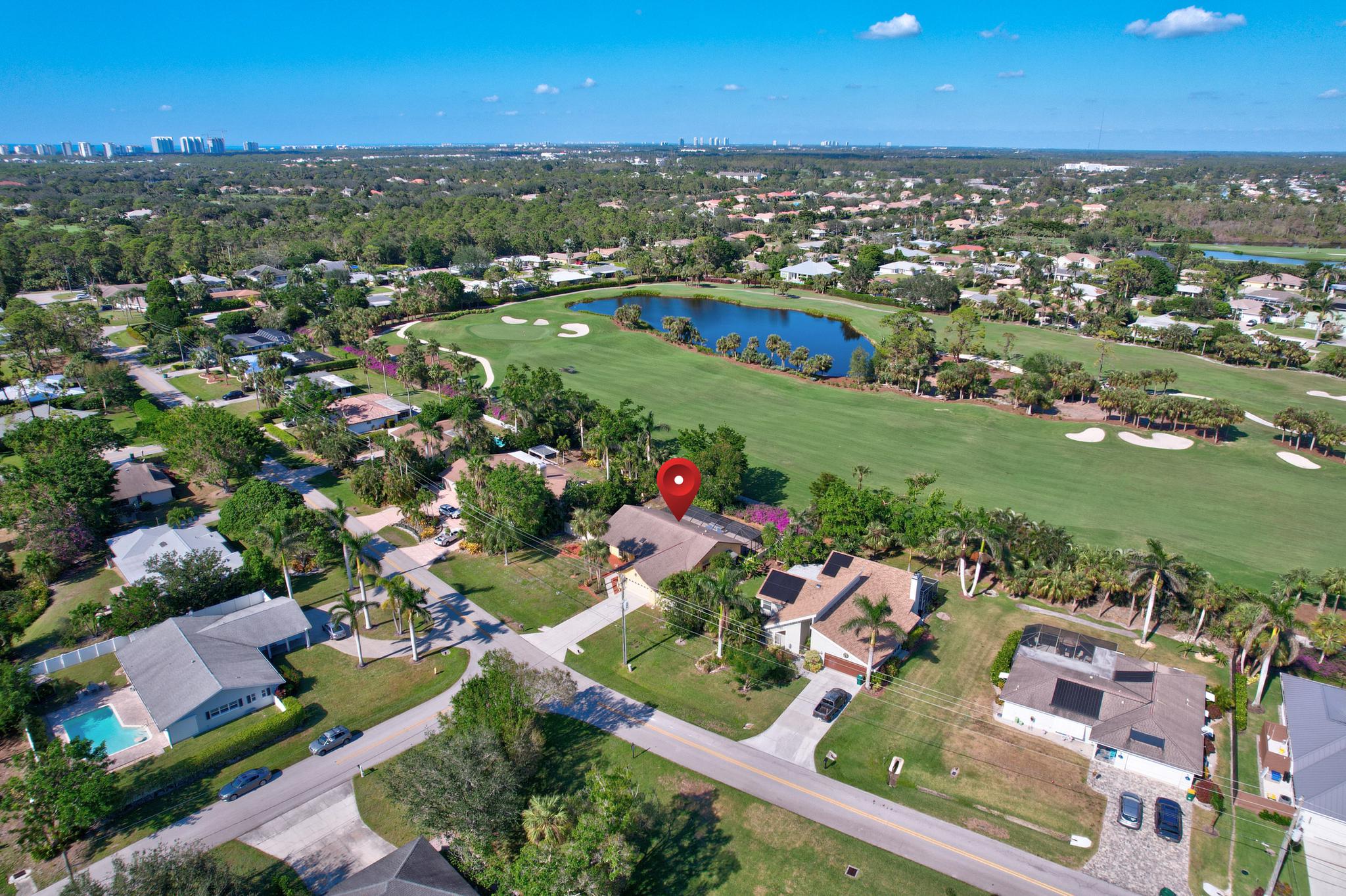 Aerial View Looking North and West - La Playa's 10th Fairway is Directly Behind the Home
