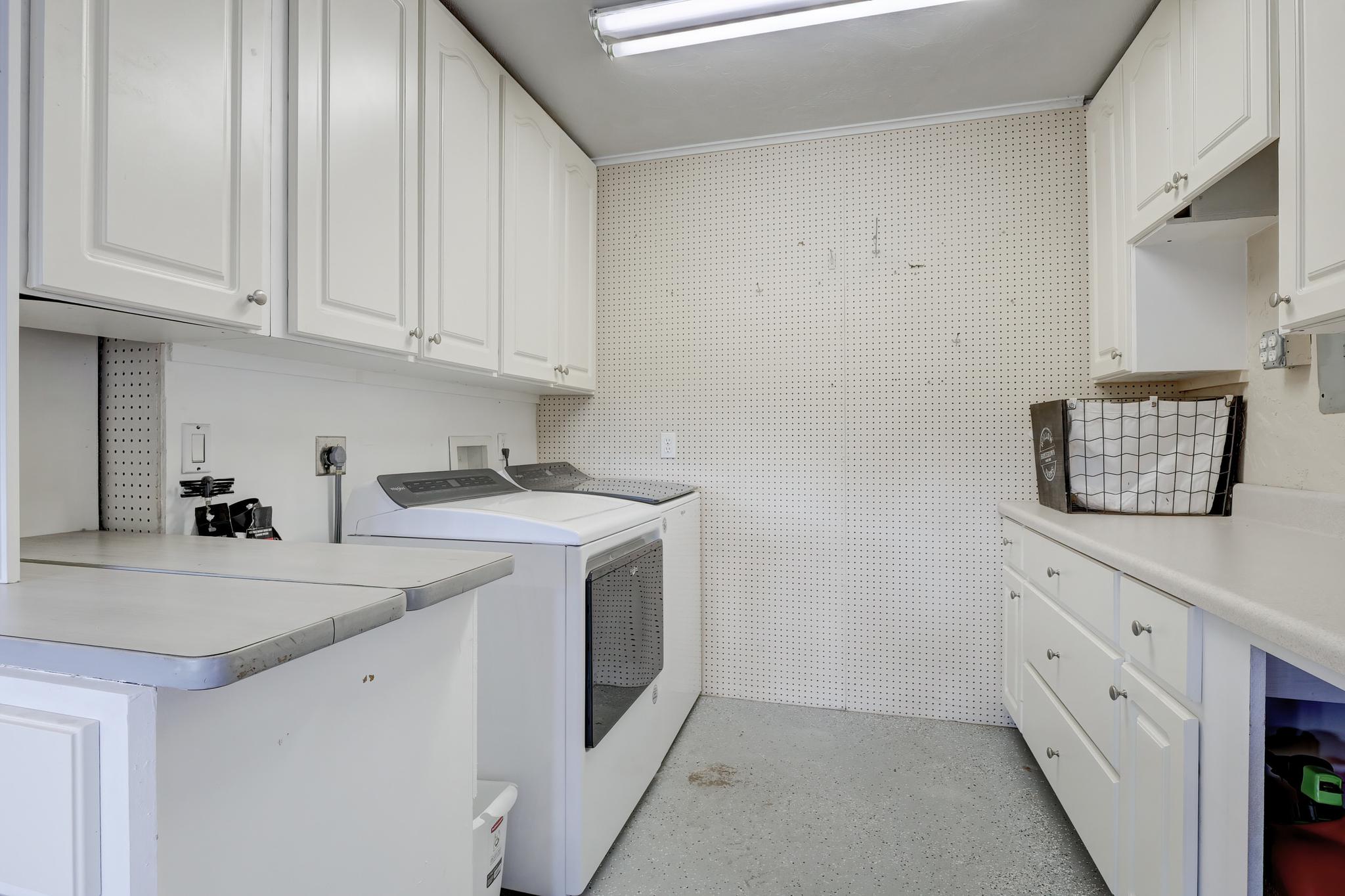The Washer and Dryer Are Located in the Back Right Of the Extended Part of the Garage