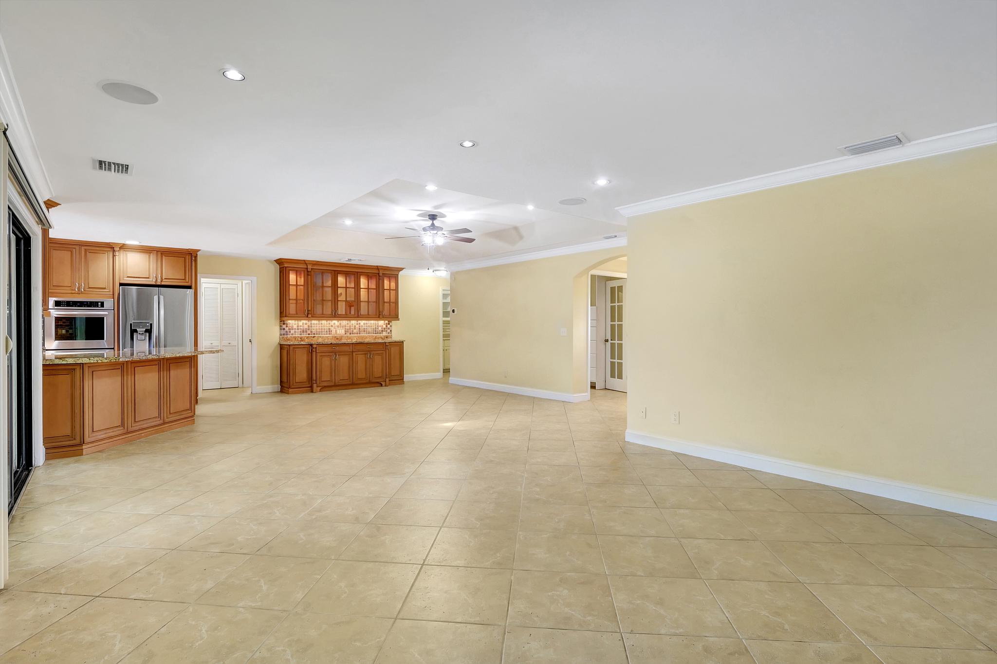 Looking Towards The Built In Credenza and the Hallway on Left Leads to Bedroom #2 and 3 and Bathroom #2