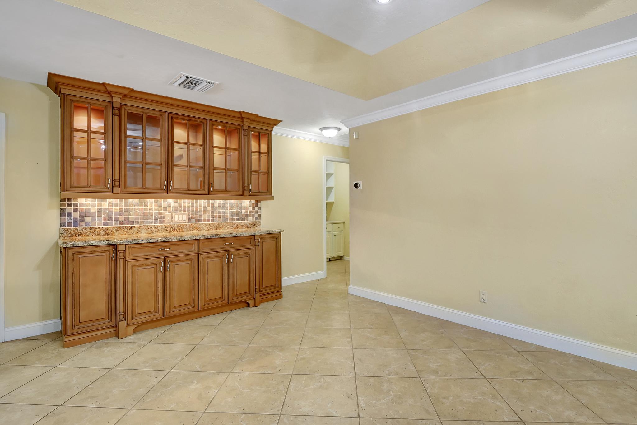 The Built in Credenza and Walk in Pantry to the Right