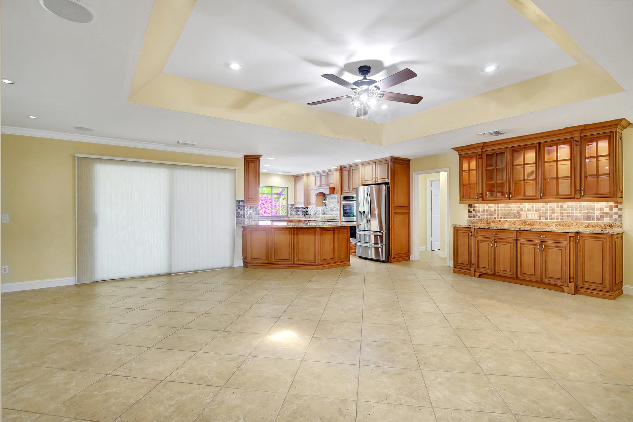 There Are Sliding Shades That Cover the Sliding Glass Doors To/From the Family Room 